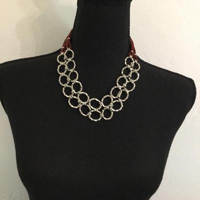 Very nice silver tone, leather type statement, necklace