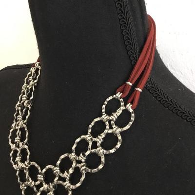 Very nice silver tone, leather type statement, necklace