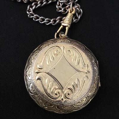 Vintage, circular gold tone, locket on chain necklace