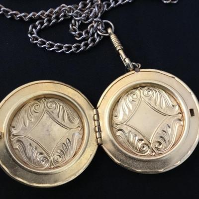 Vintage, circular gold tone, locket on chain necklace