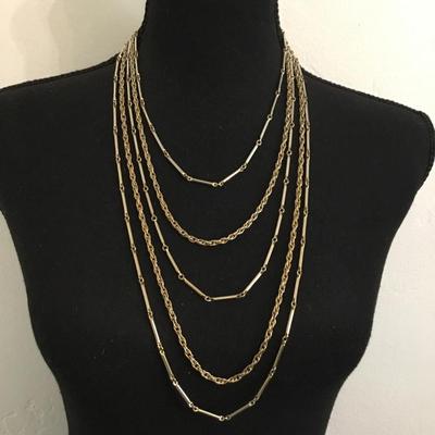 Very nice vintage Multi strand gold and silver toned necklace