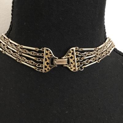 Very nice vintage Multi strand gold and silver toned necklace