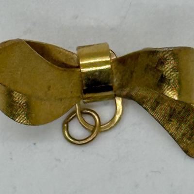 Sale Photo Thumbnail #334: gold tone and in good condition.