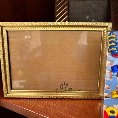 Sale Photo Thumbnail #138: Large lot of photo frames - most of them new never used but a few may have been used at some point.  Lots of variety! Great for personal use or for gifts! 