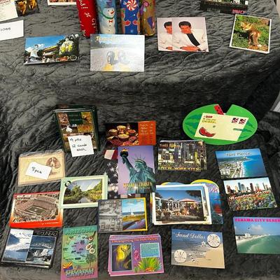 Sale Photo Thumbnail #149: This lot includes lots of gift wrap, stationary items like notepads, cards, stickers and more.  Several new unopened and unused gift items.  LOTS of Postcards!