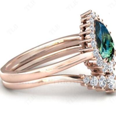 Teal Sapphire Pear Cut Rose Gold Ring