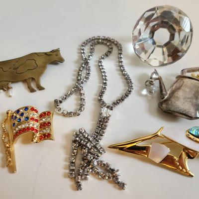 Sale Photo Thumbnail #80: This auction lot is for a Big Glass Diamond Plus Pins for All Occasions and a Vintage costume 20"s-style necklace.  That sweet and humongus gemstone is nice and hefty.  Great little fun grouping.
