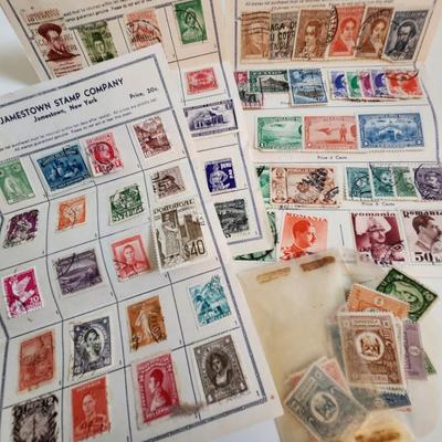 Sale Photo Thumbnail #111: This auction lot is for a Mini International Stamp Collection.  Found these stamp pages in the back of an estate book.  Nice gathering of many stamps from many countries.  Great for any stamper - maybe perfect to snag the interest of your favorite youngst