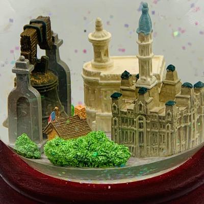 LOT 9: Lenox Glass Apple and Lincolns Home Glass Paperweight and a Philadelphia Snow Globe