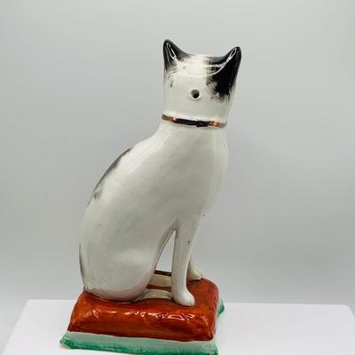 LOT 12: Old Staffordshire Cat Sitting of a Pillow, Royal Doulton Flambé Seated Cat