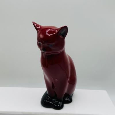 LOT 12: Old Staffordshire Cat Sitting of a Pillow, Royal Doulton Flambé Seated Cat
