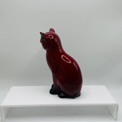 LOT 12: Old Staffordshire Cat Sitting of a Pillow, Royal Doulton Flambé Seated Cat
