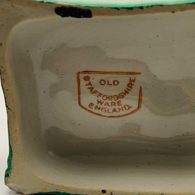 LOT 12: Old Staffordshire Cat Sitting of a Pillow, Royal Doulton Flambé Seated Cat
