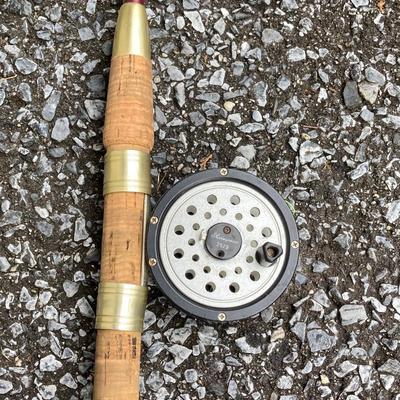 LOT 62: Fishing Rod Carrying Case and Three Fishing Rods (Eagle Claw Water Eagle, Shakespeare alpha BWS1310 and Reel 2529