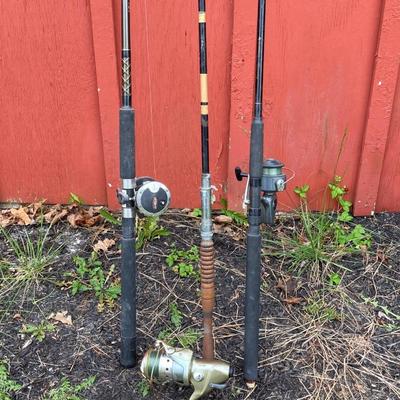 LOT 63: Collection of Three Fishing Rods and Reels - Daiwa, Okuma, Penn and Shimano