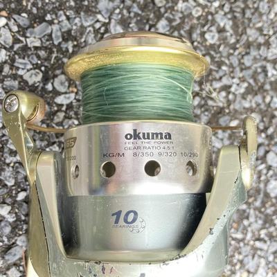 LOT 63: Collection of Three Fishing Rods and Reels - Daiwa, Okuma, Penn and Shimano