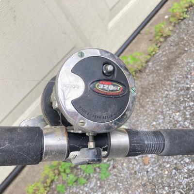 LOT 63: Collection of Three Fishing Rods and Reels - Daiwa, Okuma, Penn and Shimano