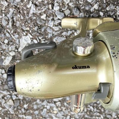 LOT 63: Collection of Three Fishing Rods and Reels - Daiwa, Okuma, Penn and Shimano