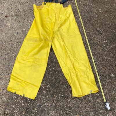 LOT 65: Fishing Gear - Wading Boots Size 10, Yellow Overalls, Cosom Flow - Troll Bait Bucket and More