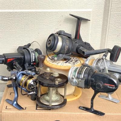 LOT 67: Collection of Fishing Reels (Garcia, Okuma, Penn, Pflueger) and More