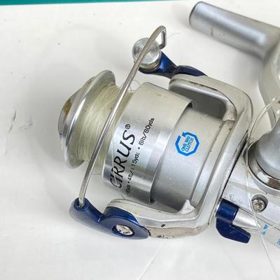 LOT 68: Fishing Reels and Line - (JC Higgins, Quantum, Shakespeare, Shimano and Storm)