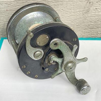 LOT 68: Fishing Reels and Line - (JC Higgins, Quantum, Shakespeare, Shimano and Storm)