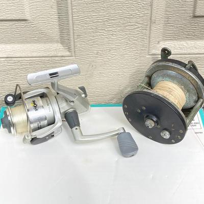 LOT 68: Fishing Reels and Line - (JC Higgins, Quantum, Shakespeare, Shimano and Storm)