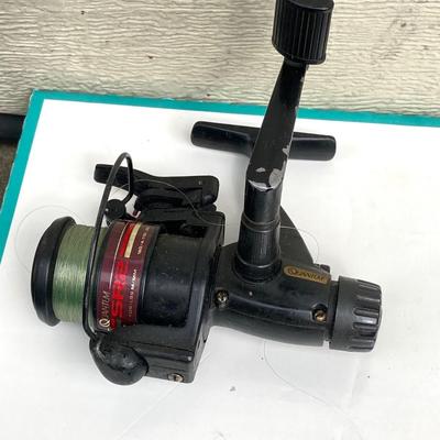 LOT 68: Fishing Reels and Line - (JC Higgins, Quantum, Shakespeare, Shimano and Storm)