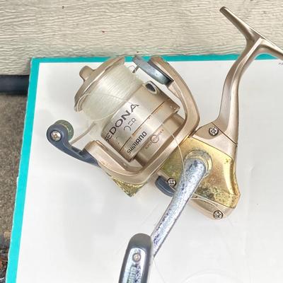 LOT 68: Fishing Reels and Line - (JC Higgins, Quantum, Shakespeare, Shimano and Storm)