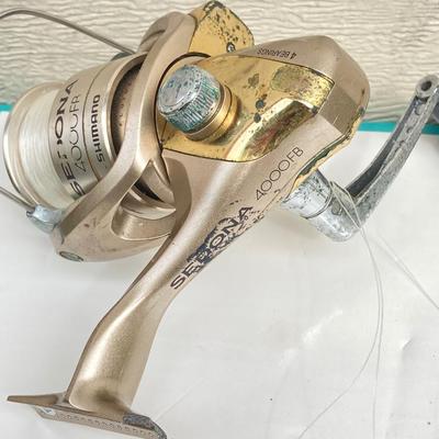 LOT 68: Fishing Reels and Line - (JC Higgins, Quantum, Shakespeare, Shimano and Storm)