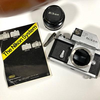 LOT 77: Vintage Nikon F 35mm Camera with Brown Coast Carrying Case and Accessories