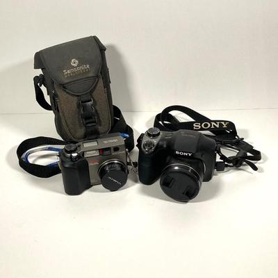 LOT 78: Sony Digital Camera Model DSC-H300 and Olympus Digital Camera Model C-3000 Zoom with Samsonite Carrying Case