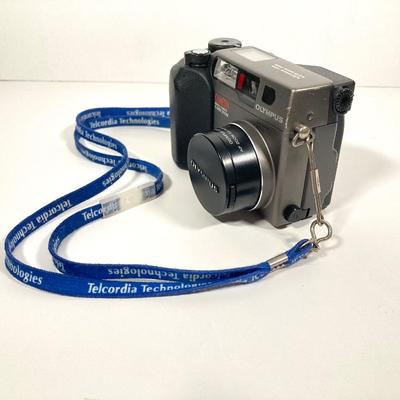 LOT 78: Sony Digital Camera Model DSC-H300 and Olympus Digital Camera Model C-3000 Zoom with Samsonite Carrying Case