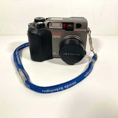 LOT 78: Sony Digital Camera Model DSC-H300 and Olympus Digital Camera Model C-3000 Zoom with Samsonite Carrying Case