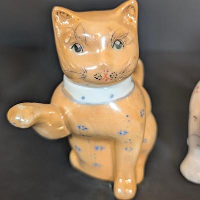 LOT 123: Zanolli Hand Painted Cat Planter along with Three Kitten Teapots