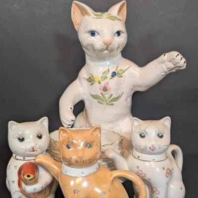 LOT 123: Zanolli Hand Painted Cat Planter along with Three Kitten Teapots