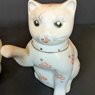 LOT 123: Zanolli Hand Painted Cat Planter along with Three Kitten Teapots