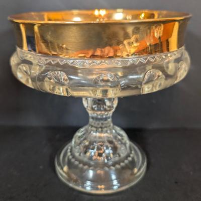 LOT 125: Indiana Glass Thumbprint Style Compote w/Gold Trim, Goebel Bells, Ansley Bells & More