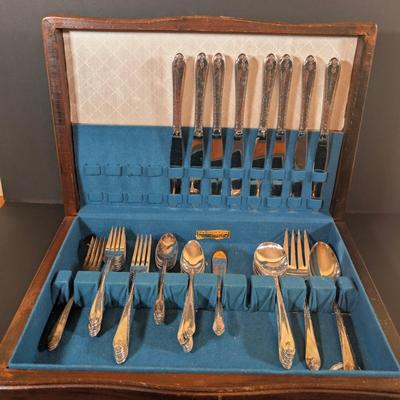 LOT 132: WM Rogers & Sons Silver Plated Flatware in Wooden Case