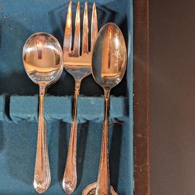 LOT 132: WM Rogers & Sons Silver Plated Flatware in Wooden Case
