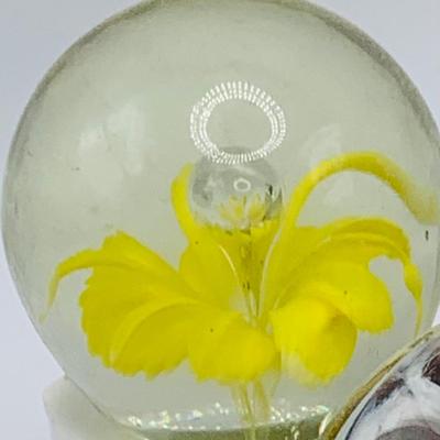 LOT 167: Collection of Art Glass Floral Pattern Paperweights and a Wheaton Brown Ribbon Paperweight