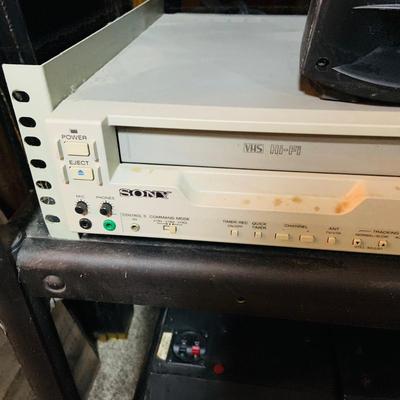 LOT:173: Large Media Cart with Klipsch and Other Speakers, Tascam Model 112R Cassette Player/Recorder Sony VHS Player/Recorder