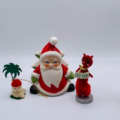 LOT 174: Large Assortment of Ceramic/ Porcelain Holiday Decor Featuring a Lenox Serving Dish, Napco Mr and Mrs Claus, and Much More
