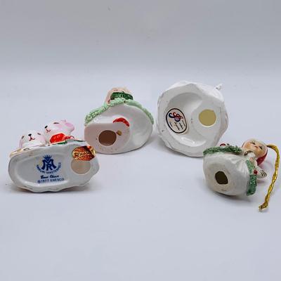 LOT 174: Large Assortment of Ceramic/ Porcelain Holiday Decor Featuring a Lenox Serving Dish, Napco Mr and Mrs Claus, and Much More