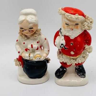 LOT 174: Large Assortment of Ceramic/ Porcelain Holiday Decor Featuring a Lenox Serving Dish, Napco Mr and Mrs Claus, and Much More