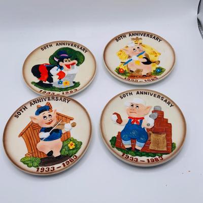 LOT 178: Collection of Vintage Toys Including Composite Doll, Disney Three Little Pigs Anniversary Plates, Mickey Mouse Digital. Clock...
