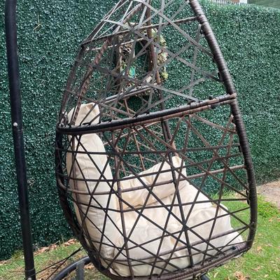 Sale Photo Thumbnail #84: Outdoor Hanging Egg Chair with Stand and Cushion. The cushion needs to be cleaned.

Base: 41” x 36.5” 
About 74” tall