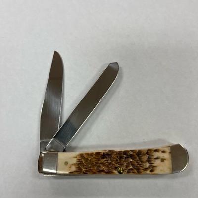 Case XX Amber Bone Peach Seed Jig Trapper