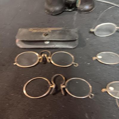 OLD EYE GLASSES AND BINOCULARS
