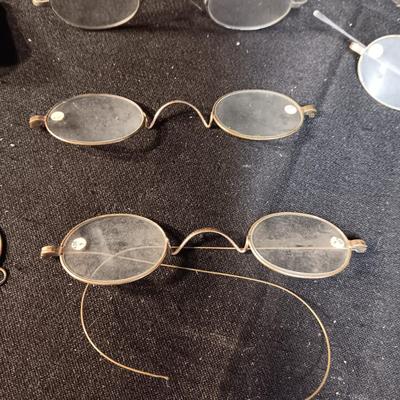 OLD EYE GLASSES AND BINOCULARS